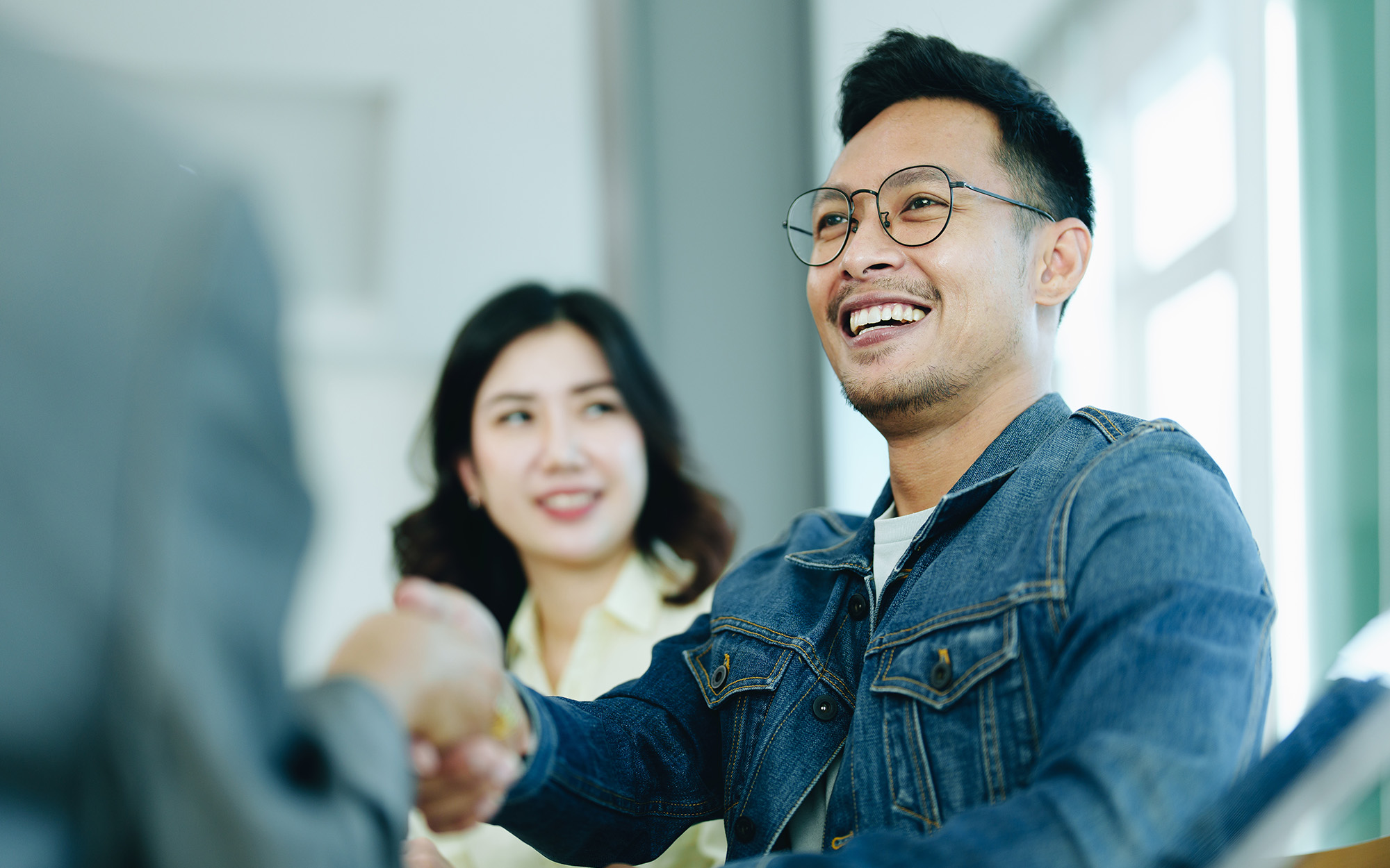 The Bank's Mortgage Officers Shake Hands With Customers