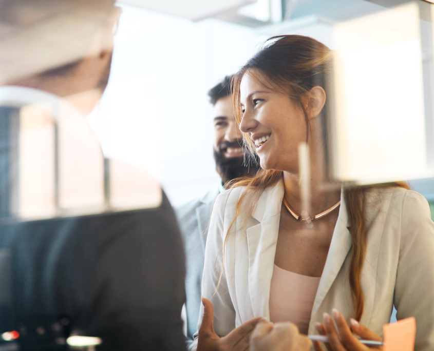 Collaboration And Analysis By Business People Working In Office